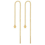 Gold threader earrings with small beads on a white background